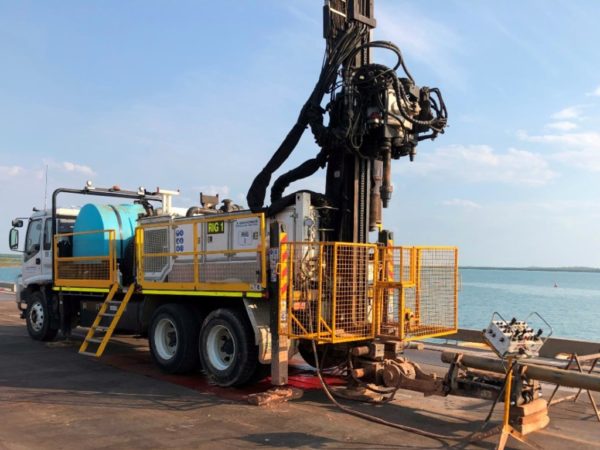 Truck mounted drill drilling over water