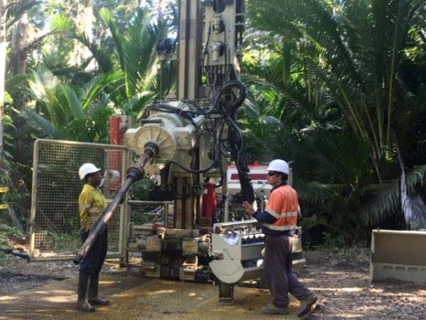 Sonic Drill loading rods in Papua New Guinea